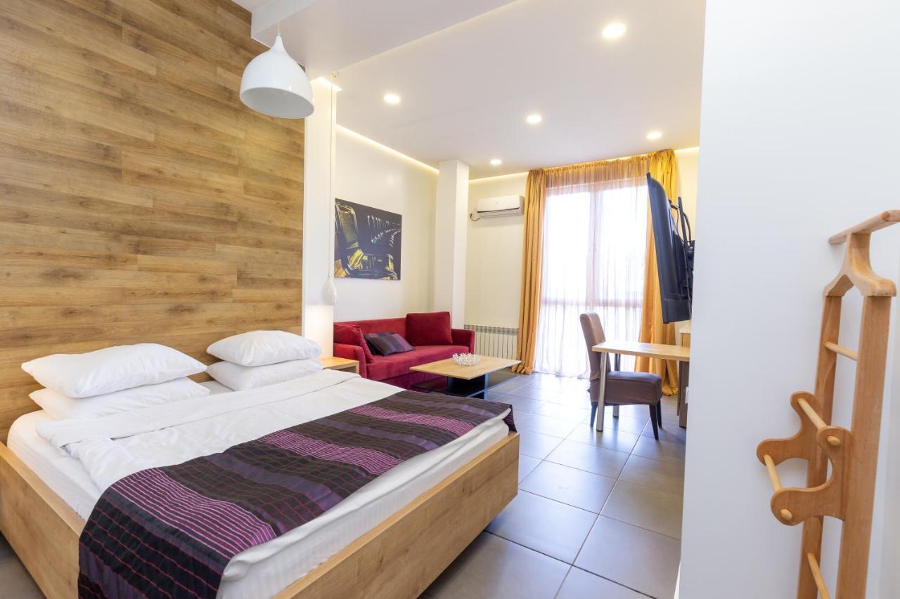 Studio met Kingsize Bed en Slaapbank