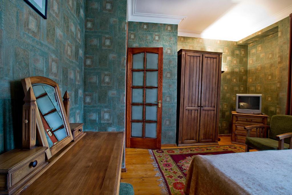 Suite mit Kingsize-Bett und Balkon
